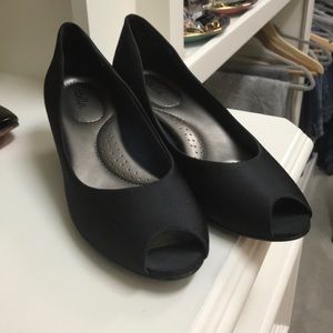 Amazingly comfortable black satin kitten heel.